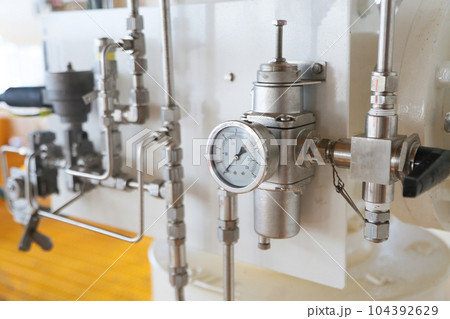 Close up of controller unit or control process of oil and gas process on the platform. The controller for control any equipment of oil and gas process by technician or control room. Close up of controller unit or control process of oil and gas process on the platform. The controller for control any equipment of oil and gas process by technician or control room. 104392629