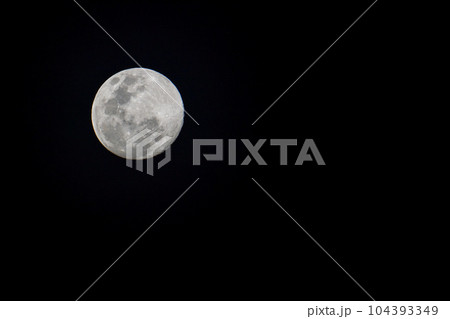Close-up of the moon in the dark night sky. Close-up of the moon in the dark night sky. 104393349
