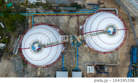 Aerial top view LPG Liquefied Petroleum Gas storage tank, LPG gas storage tank and pipeline industrial plant, LPG distribution station facility and gas manufacturing industry. Aerial top view LPG Liquefied Petroleum Gas storage tank, LPG gas storage tank and pipeline industrial plant, LPG distribution station facility and gas manufacturing industry. 104395206