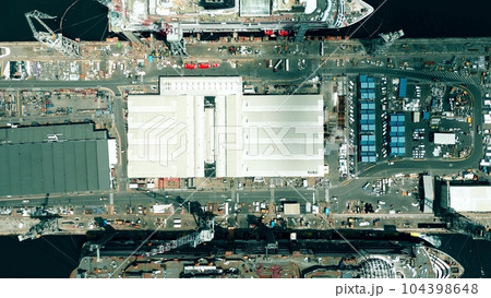 Aerial top down shot of two new cruise ships being built in the shipyard Aerial top down shot of two new cruise ships being built in the shipyard 104398648