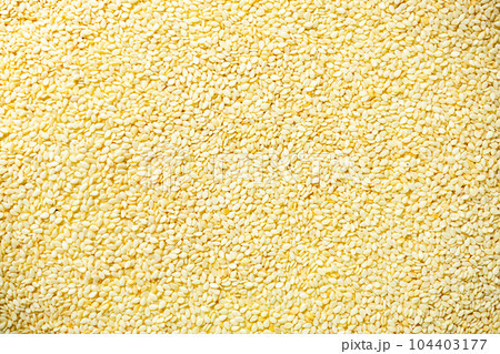 Top view pile of organic white sesame seeds. Top view pile of organic white sesame seeds. 104403177