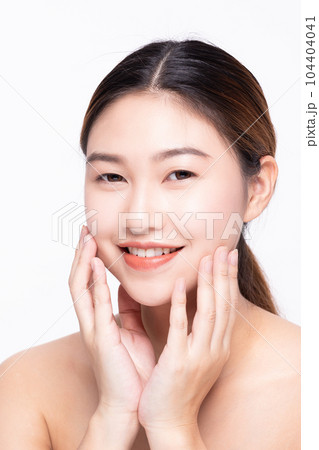 Beautiful Asian woman touching soft cheek smile with clean and fresh skin Happiness and cheerful with positive emotional,isolated on white background,Beauty Self Care and Cosmetics Concept Beautiful Asian woman touching soft cheek smile with clean and fresh skin Happiness and cheerful with positive emotional,isolated on white background,Beauty Self Care and Cosmetics Concept 104404041