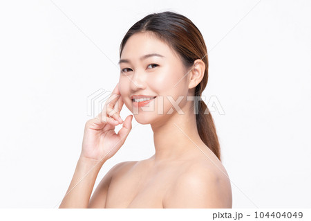 Beautiful Asian woman touching soft cheek smile with clean and fresh skin Happiness and cheerful with positive emotional,isolated on white background,Beauty Self Care and Cosmetics Concept Beautiful Asian woman touching soft cheek smile with clean and fresh skin Happiness and cheerful with positive emotional,isolated on white background,Beauty Self Care and Cosmetics Concept 104404049