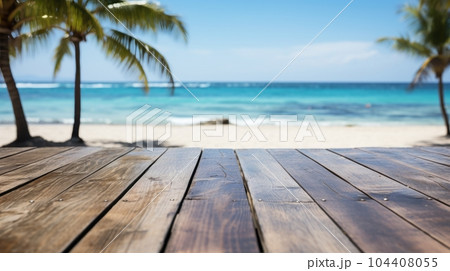 Empty wooden table with a summer sea and palms 104408055