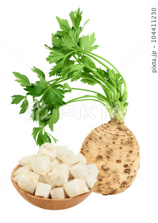 diced celery root in wooden bowl isolated on white background 104411230