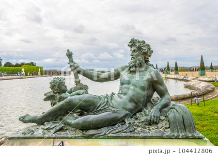 Rhone statue at The Water Garden in the Gardens of Versailles, Chateau Versailles near Paris, France. Rhone statue at The Water Garden in the Gardens of Versailles, Chateau Versailles near Paris, France. 104412806