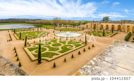 Orangery Garden at the crossroads of several groves in the Gardens of Versailles, Chateau Versailles near Paris, France. 104412807