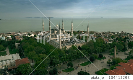 Aerial view of the famous Blue Mosque or the Sultan Ahmed Mosque and the Obelisk of Theodosius in Istanbul, Turkey Aerial view of the famous Blue Mosque or the Sultan Ahmed Mosque and the Obelisk of Theodosius in Istanbul, Turkey 104413298