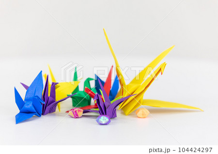 Colorful paper cranes on a white background. Colorful paper cranes on a white background. 104424297