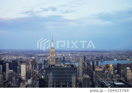 USA, New York, New York City, Aerial view of Manhattan skyscrapers at dusk USA, New York, New York City, Aerial view of Manhattan skyscrapers at dusk 104425769