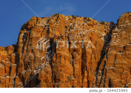 USA, Utah, Springdale, Zion National Park, Blue sky above rough rocky mountain 104425993