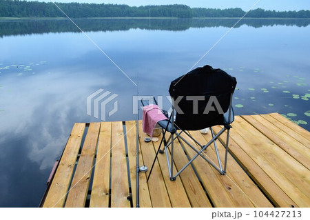 Quiet, summer morning before fishing on the lake. Quiet, summer morning before fishing on the lake. 104427213