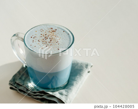Blue pea latte or blue matcha latte with copy space 104428005
