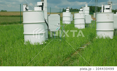 Science station scientific measurement respiration wheat common agriculture field Triticum aestivum soil scientist working technology work earth technological monitoring carbon dioxide oxide oxygen 104430499