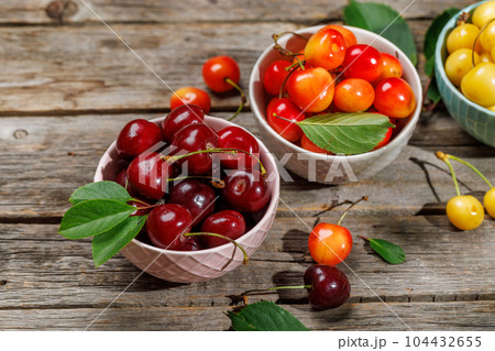 A vibrant and colorful cherry, bursting with sweet juiciness A vibrant and colorful cherry, bursting with sweet juiciness 104432655