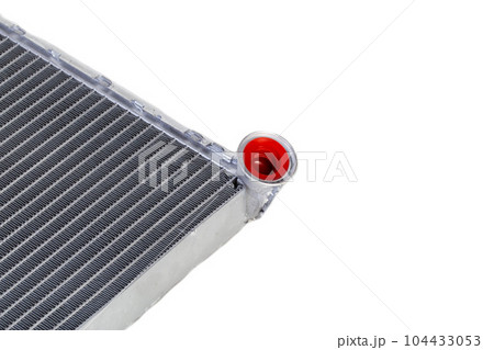 Aluminum radiator of a car stove on a white background, close-up, isolated Aluminum radiator of a car stove on a white background, close-up, isolated 104433053