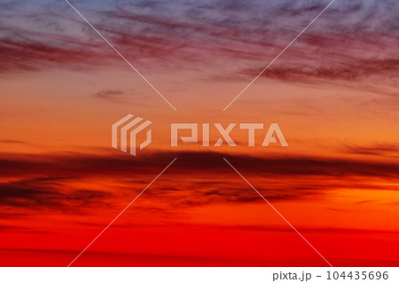 Sunset red evening sky. Warm, saturated colors. Background abstract image Sunset red evening sky. Warm, saturated colors. Background abstract image 104435696