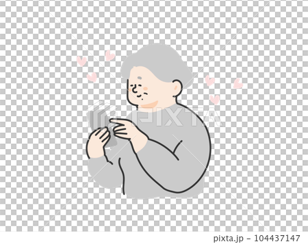 スマートフォンを操作する笑顔なシニア女性 スマートフォンを操作する笑顔なシニア女性 104437147