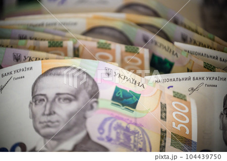Stack of ukrainian money hryvnia grivna, hryvna with 500 banknotes 104439750
