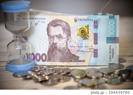 Background 1000 hryvnias. Money texture. Many Ukrainian hryvnias. Ukrainian banknote with Volodymyr Vernadsky 104439760