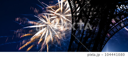 Celebratory colorful fireworks over the Eiffel Tower in Paris, France 104441080