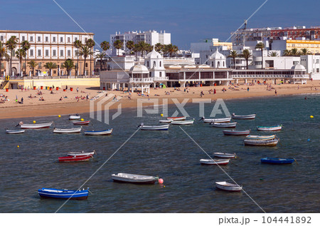 Colorful fishing boats in the bay of Cadiz on a sunny day. Colorful fishing boats in the bay of Cadiz on a sunny day. 104441892