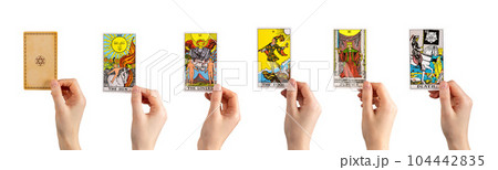 Lodz, Poland June 19 2023 Tarot set, major arcanas in hands isolated Lodz, Poland June 19 2023 Tarot set, major arcanas in hands isolated 104442835