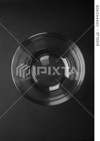 Transparent glass bowl as an element of kitchen utensils for cooking at home 104443406