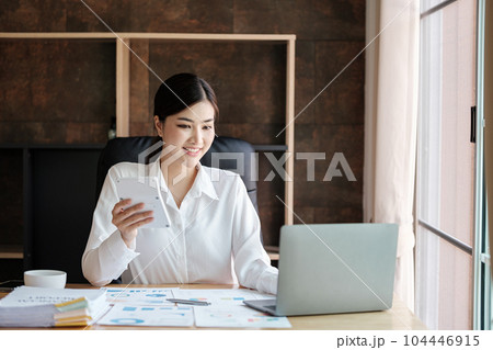 Smart asian Woman working in the Office . 104446915