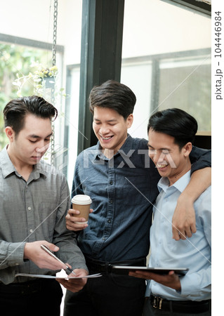 Group of business man discussion and brainstorming, bookkeeping audit graph and chart in tablet, teamwork concept. Group of business man discussion and brainstorming, bookkeeping audit graph and chart in tablet, teamwork concept. 104446984