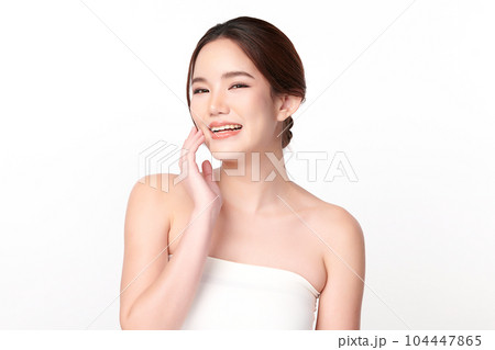 Beautiful young asian woman with clean fresh skin on white background, Face care, Facial treatment, Cosmetology, beauty and spa, Asian women portrait. Beautiful young asian woman with clean fresh skin on white background, Face care, Facial treatment, Cosmetology, beauty and spa, Asian women portrait. 104447865