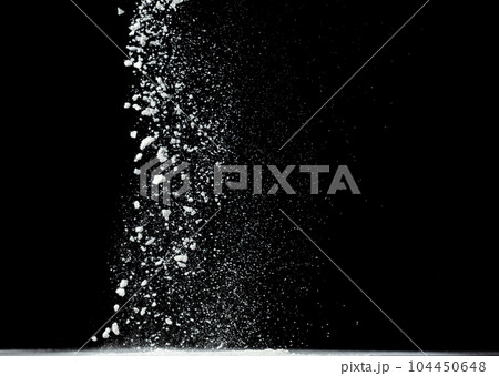Tapioca starch flour fly explosion, White powder tapioca starch fall down in air. Seasoning flour powder is element material. Eyeshadow crush make up. Black background Isolated selective focus blur Tapioca starch flour fly explosion, White powder tapioca starch fall down in air. Seasoning flour powder is element material. Eyeshadow crush make up. Black background Isolated selective focus blur 104450648