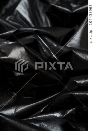 Black transparent background of flowing fabric, in the style of monochrome colors. Ai generative art 104458962