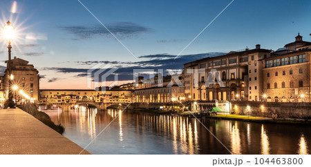 Night scene of the Ponte Vecchio, the historic bridge over Arno river in Florence, Tuscany, Italy that is popular tourist destination Night scene of the Ponte Vecchio, the historic bridge over Arno river in Florence, Tuscany, Italy that is popular tourist destination 104463800