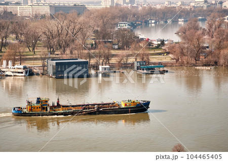 Bulk carrier sails down the Sava river Bulk carrier sails down the Sava river 104465405