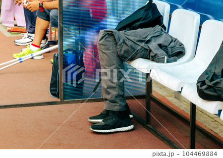 men prosthetics in sports trousers and running shoes men prosthetics in sports trousers and running shoes 104469884