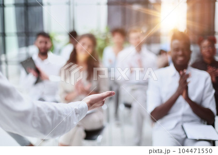 Business people attending a seminar with social distancing Business people attending a seminar with social distancing 104471550