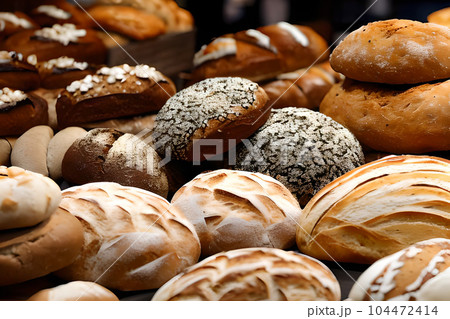 Some various bread served at the table. 104472414