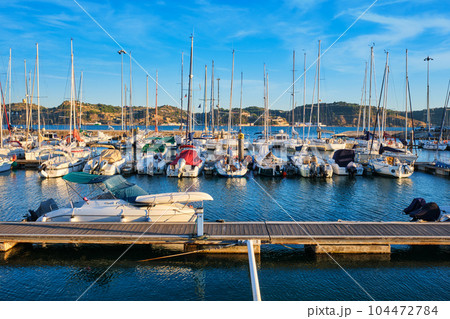 Lisbon marina on Tagus river with moored yachts and boats on sunset. Belem, Lisbon, Portugal Lisbon marina on Tagus river with moored yachts and boats on sunset. Belem, Lisbon, Portugal 104472784