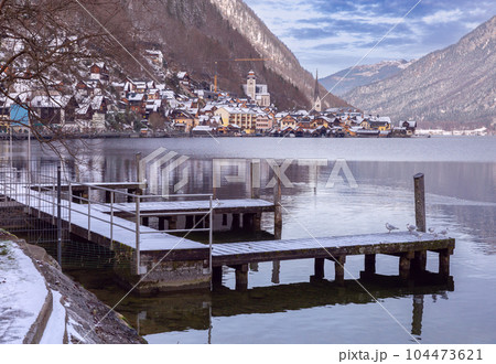 Hallstatt. Scenic view of the city and the lake at sunset. 104473621