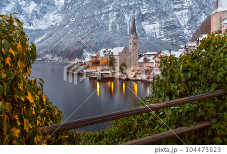 Hallstatt. Scenic view of the city and the lake at sunset. 104473623