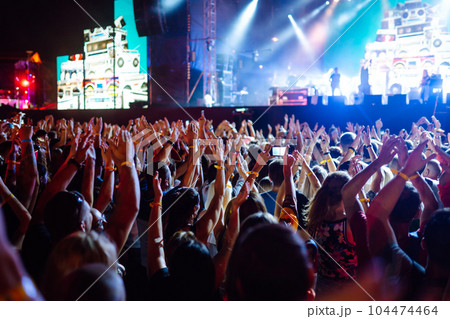 ?rowd with raised hands at music festival. Youth, party, vacation concept. 104474464