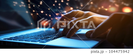 Hands of person type on a laptop. Close-up Hands of person type on a laptop. Close-up 104475942