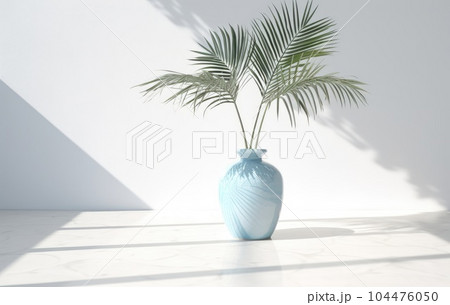 Light blue wall with shade and plant on the floor in a vase 104476050