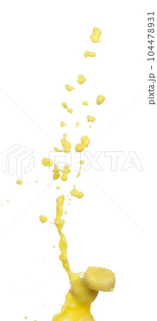 Banana juice flying fall down, yellow banana chopped slice juice wave explode. Yellow paint color splash throwing in Air. White background Isolated high speed shutter, throwing freeze stop motion Banana juice flying fall down, yellow banana chopped slice juice wave explode. Yellow paint color splash throwing in Air. White background Isolated high speed shutter, throwing freeze stop motion 104478931