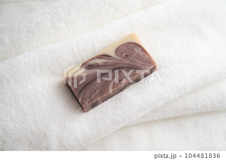 Beauty handmade soap on a terry towel. 104481836