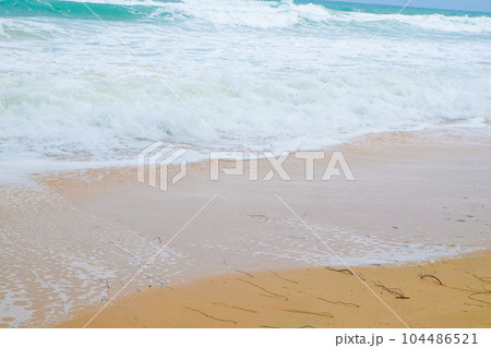 Sea wave beach turquoise water 104486521