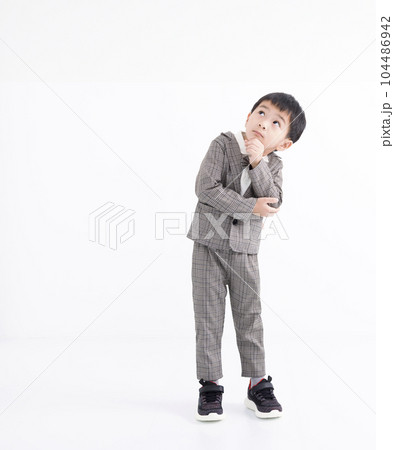 Let me think., child thinking and doubting, making choice 104486942