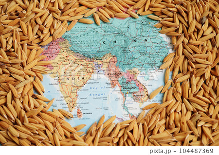 Bangkok, Thailand March 12, 2023 China map with grain rice from agriculture farm. Law and justice court concept. Bangkok, Thailand March 12, 2023 China map with grain rice from agriculture farm. Law and justice court concept. 104487369
