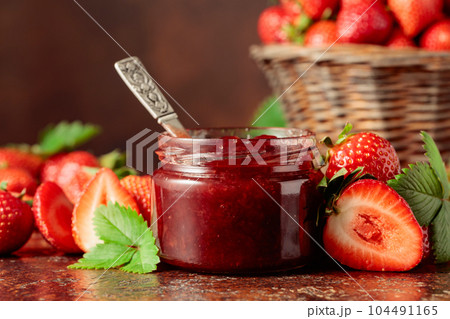 Strawberry jam and fresh berries. 104491165